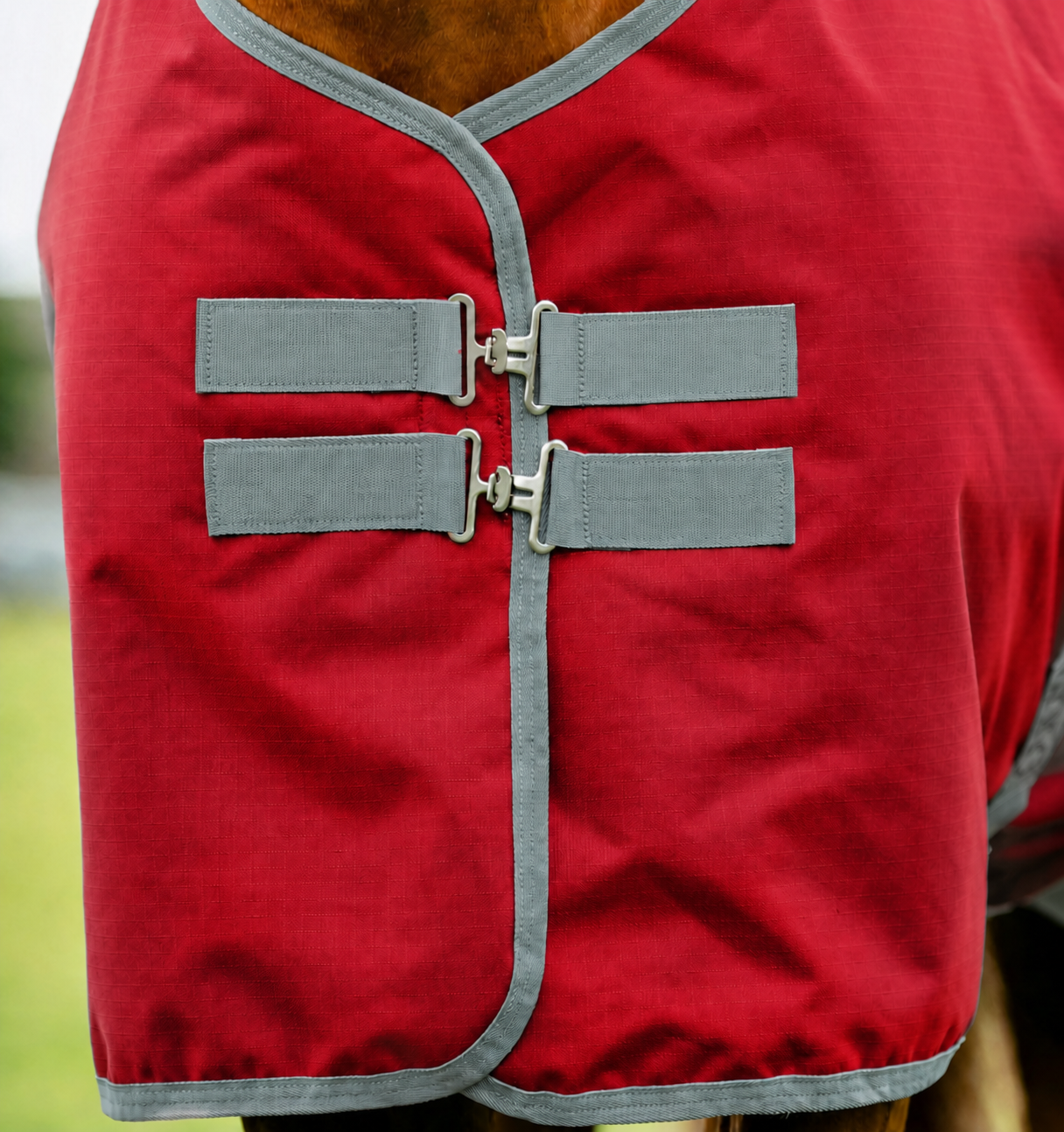 Red horse rug front closure hardware detail