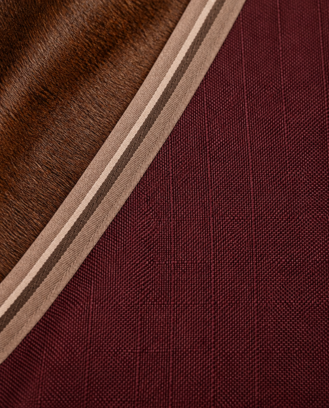 Burgundy horse rug shell fabric and layered binding detail