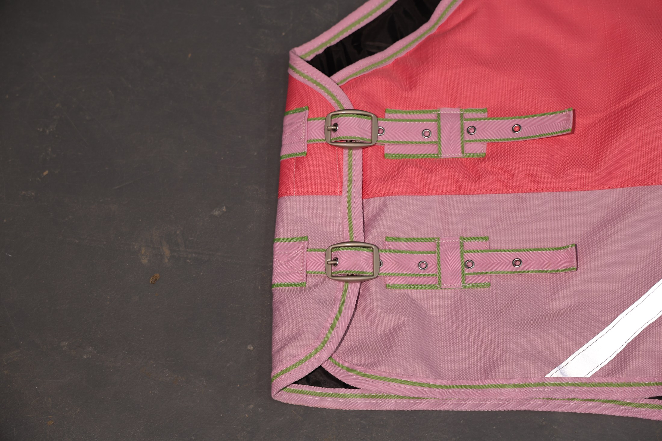 Adjustable front closure on physical pony rug sample